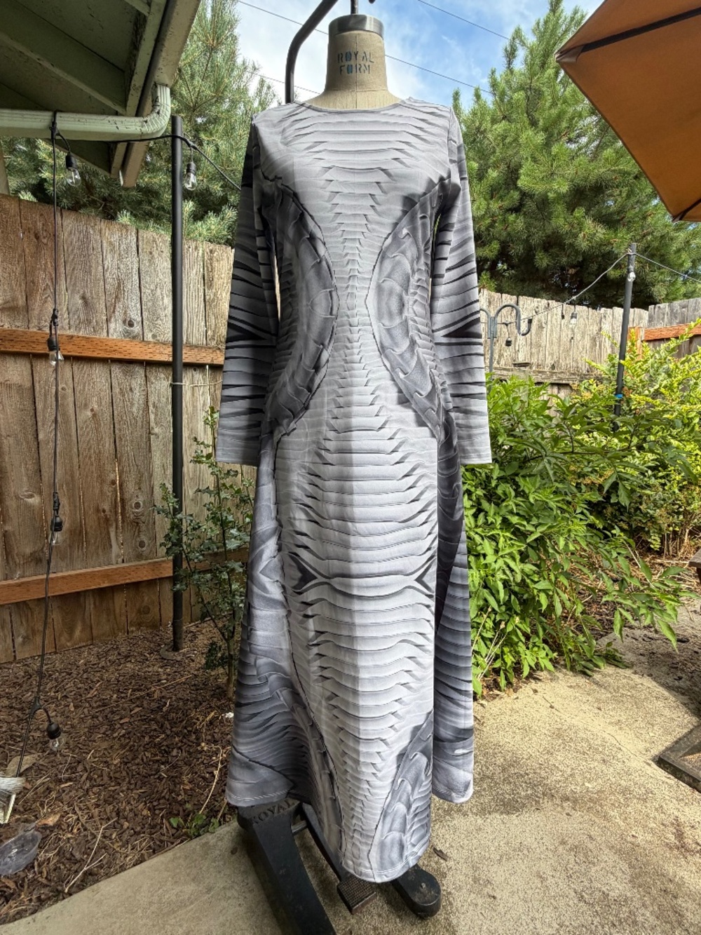 Making The Cut Georgia Hardinge long-sleeve printed maxi dress